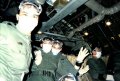 Airforce Association NSW 2AFDS photo gallery - April 1990 - LAC Richard Long, LAC Wilson Usuga, AC Darren Enright and LAC Greg Stuchley of No. 2 Airfield Defence Squadron (2AFDS) aboard a 36SQN C130H conducting flood relief operations from Narromine, NSW