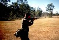 Airforce Association NSW 2AFDS photo gallery - 1991 - LAC Steve Patterson of No. 2 Airfield Defence Squadron (2AFDS) firing an M16A1 rifle at Purga Range near RAAF Base Amberley